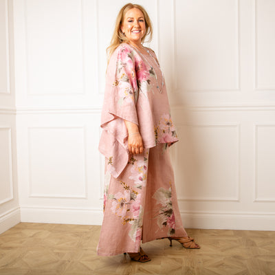 The dusky pink Bouquet Print Linen Top with a round neckline and a relaxed fit